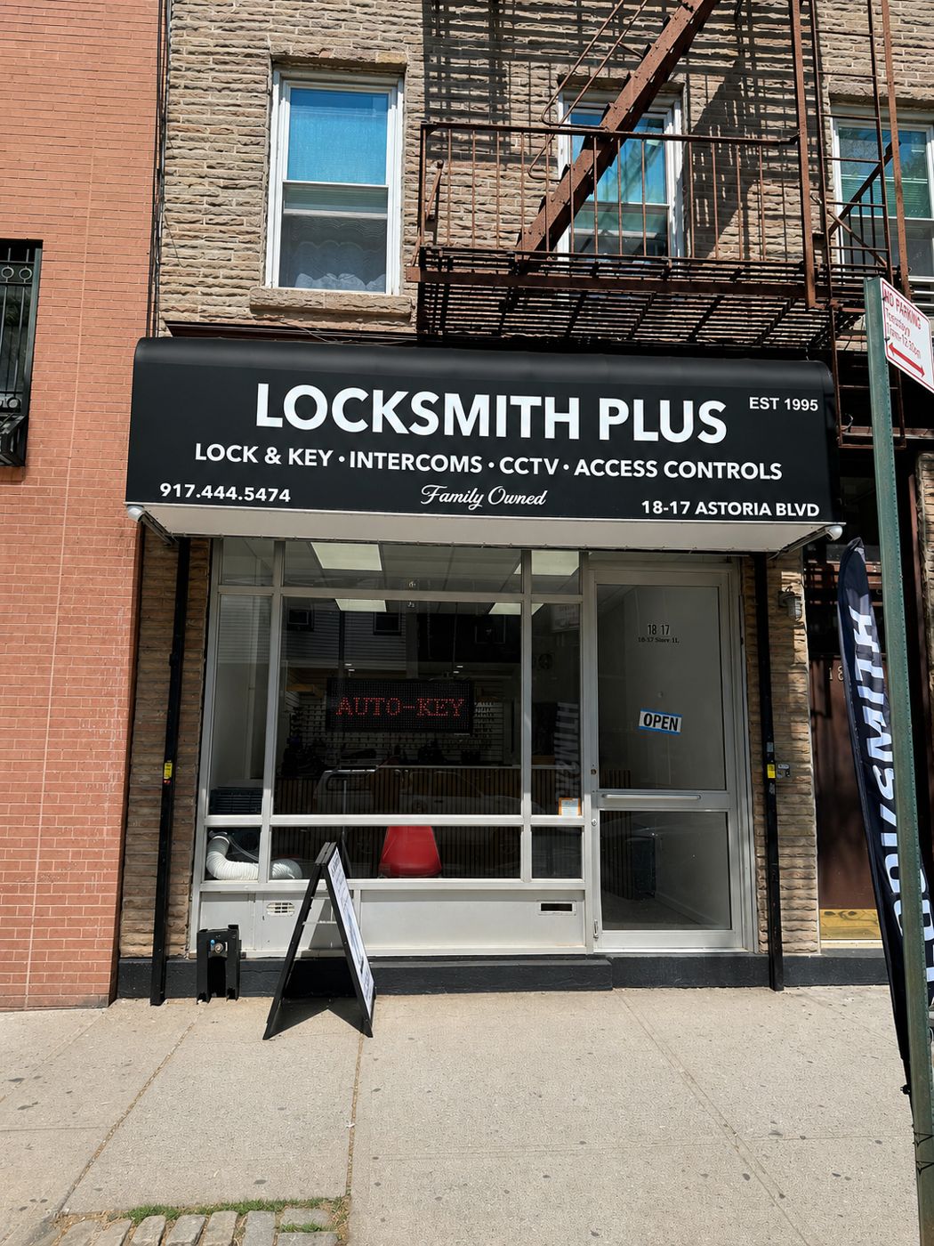 Locksmith Plus shop front at 18-17 Astoria Blvd, Astoria, Queens