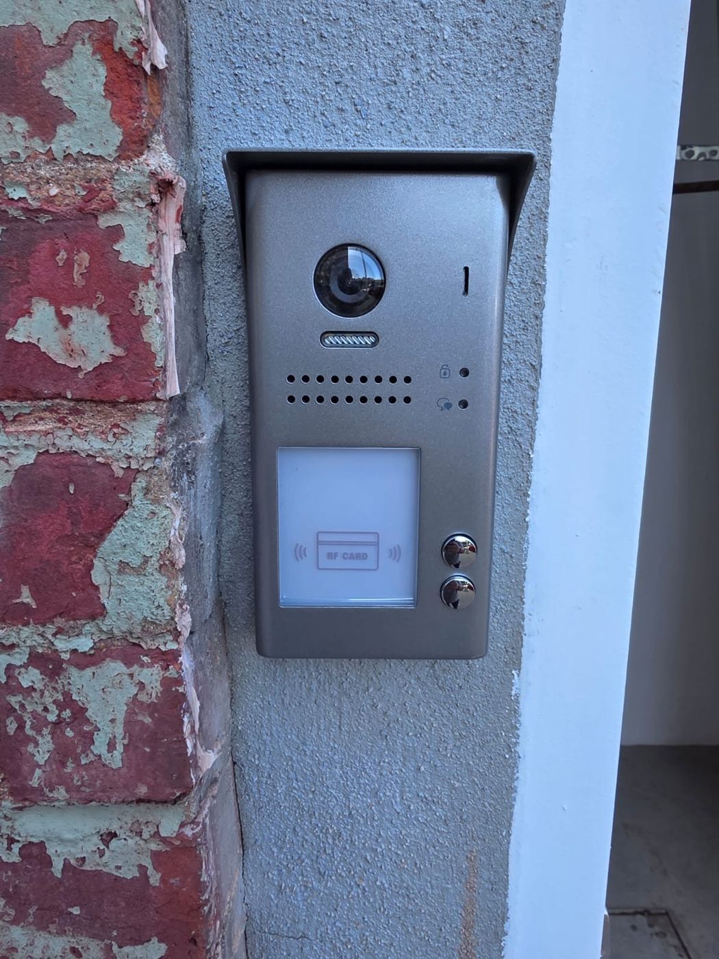 Video intercom with fob reader installed at a building entrance